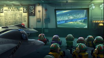 Movie still from “Planes” (2013), directed by Klay Hall – A group of people sitting in front of a screen; Wide shot, Low angle