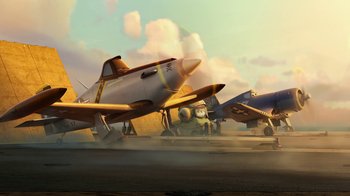 Movie still from “Planes” (2013), directed by Klay Hall – A group of airplanes sitting on top of a runway; Extreme Wide shot, Low angle