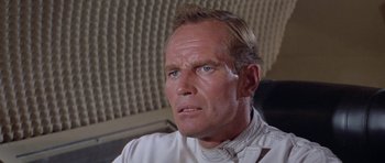 Movie still from “Planet of the Apes” (1968), directed by Franklin J. Schaffner – An older man with a goatee looking at the camera; Close Up shot, Low angle