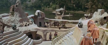 Movie still from “Planet of the Apes” (1968), directed by Franklin J. Schaffner – A group of people standing on top of a sandy beach; Extreme Wide shot, High angle