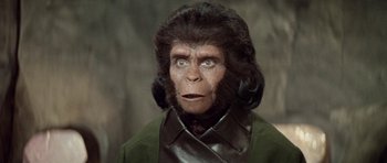 Movie still from “Planet of the Apes” (1968), directed by Franklin J. Schaffner – An image of a man dressed like a gorilla; Close Up shot, Over the shoulder angle