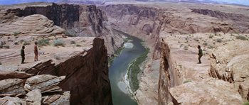 Movie still from “Planet of the Apes” (1968), directed by Franklin J. Schaffner – A view of a river flowing through a canyon; Extreme Wide shot, High angle