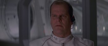 Movie still from “Planet of the Apes” (2001), directed by Tim Burton – A person wearing a headset; Close Up shot, Low angle