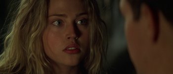 Movie still from “Planet of the Apes” (2001), directed by Tim Burton – A woman's face in the dark; Close Up shot, Over the shoulder angle