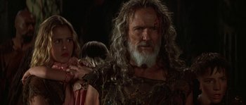 Movie still from “Planet of the Apes” (2001), directed by Tim Burton – An older man with long hair and a white beard; Close Up shot, Over the shoulder angle