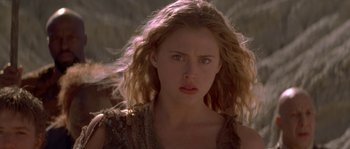 Movie still from “Planet of the Apes” (2001), directed by Tim Burton – A person with long blonde hair; Close Up shot, Low angle