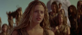 Movie still from “Planet of the Apes” (2001), directed by Tim Burton – A beautiful young woman with long blonde hair; Close Up shot, Low angle