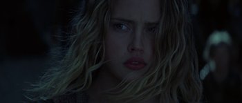 Movie still from “Planet of the Apes” (2001), directed by Tim Burton – A person with long blonde hair; Close Up shot, Low angle