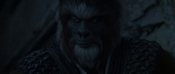 Movie still from “Planet of the Apes” (2001), directed by Tim Burton – A person wearing a gorilla mask; Close Up shot, Over the shoulder angle