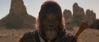 Movie still from “Planet of the Apes” (2001), directed by Tim Burton – A man's face in a gorilla costume; Close Up shot, Low angle