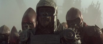 Movie still from “Planet of the Apes” (2001), directed by Tim Burton – An image of a man with a helmet on; Close Up shot, Low angle