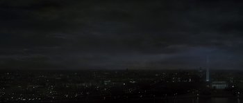 Movie still from “Planet of the Apes” (2001), directed by Tim Burton – A view of a city at night from a hill; Extreme Wide shot, Low angle