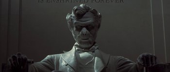 Movie still from “Planet of the Apes” (2001), directed by Tim Burton – A statue of abraham lincoln; Close Up shot, Low angle