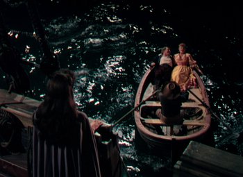 Movie still from “Plymouth Adventure” (1952), directed by Clarence Brown – Two people in a boat on a body of water; Wide shot, High angle