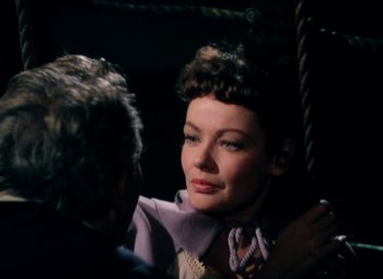 Movie still from “Plymouth Adventure” (1952), directed by Clarence Brown – A man and a woman are talking to each other; Close Up shot, High angle