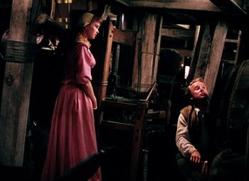 Movie still from “Plymouth Adventure” (1952), directed by Clarence Brown – A man and a woman are in a room; Wide shot, High angle