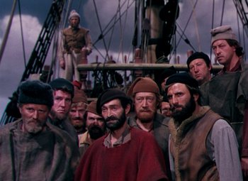 Movie still from “Plymouth Adventure” (1952), directed by Clarence Brown – A group of men standing next to each other on top of a boat; Medium shot, High angle