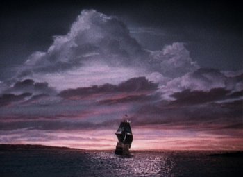 Movie still from “Plymouth Adventure” (1952), directed by Clarence Brown – A sail boat in the middle of the ocean under a cloudy sky at sunset; Extreme Wide shot, Low angle