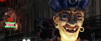 Movie still from “Point of No Return” (1993), directed by John Badham – The face of a man with a blue hat; Extreme Close Up shot, Low angle