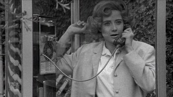 Movie still from “Poison” (1991), directed by Todd Haynes – An old photo of a woman talking on a phone; Close Up shot, Low angle