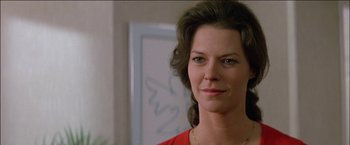 Movie still from “Poltergeist” (1982), directed by Tobe Hooper – A person wearing a red shirt; Close Up shot, Low angle