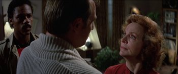 Movie still from “Poltergeist” (1982), directed by Tobe Hooper – A man and a woman talking to each other; Close Up shot, Over the shoulder angle