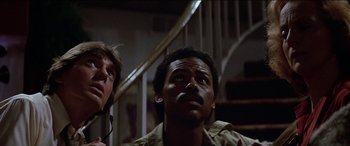 Movie still from “Poltergeist” (1982), directed by Tobe Hooper – A man looking up at the ceiling of a room; Close Up shot, Low angle