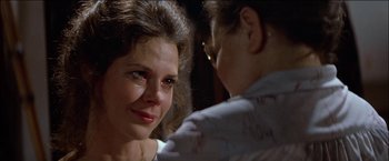 Movie still from “Poltergeist” (1982), directed by Tobe Hooper – A woman is crying in front of another woman; Close Up shot, Over the shoulder angle