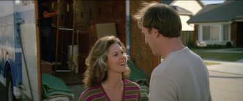 Movie still from “Poltergeist” (1982), directed by Tobe Hooper – A man and a woman talking to each other outside; Close Up shot, Over the shoulder angle
