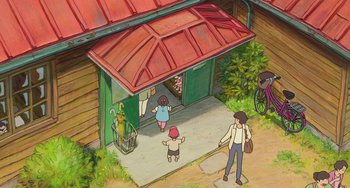 Movie still from “Ponyo” (2008), directed by Hayao Miyazaki – An illustration of a man and two children outside of a house; Extreme Wide shot, Overhead angle