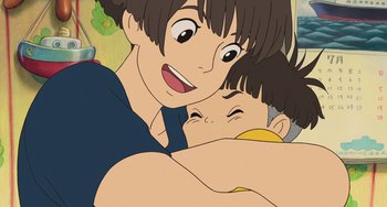 Movie still from “Ponyo” (2008), directed by Hayao Miyazaki – An illustration of a woman holding a child; Close Up shot, Over the shoulder angle