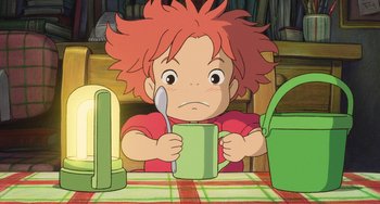 Movie still from “Ponyo” (2008), directed by Hayao Miyazaki – A little boy holding a green cup and a spoon; Medium shot, High angle