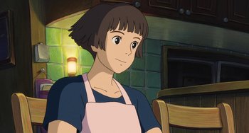 Movie still from “Ponyo” (2008), directed by Hayao Miyazaki – An animated picture of a woman in a kitchen; Close Up shot, Over the shoulder angle