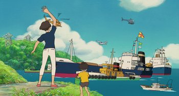 Movie still from “Ponyo” (2008), directed by Hayao Miyazaki – A woman and a child standing in front of a boat; Extreme Wide shot, Low angle