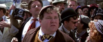 Movie still from “Popeye” (1980), directed by Robert Altman – A group of men standing next to each other wearing hats; Close Up shot, Low angle