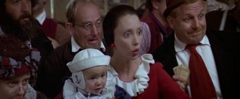 Movie still from “Popeye” (1980), directed by Robert Altman – A man and a woman and a baby in sailor outfits; Close Up shot, Low angle
