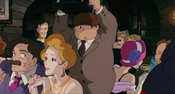 Movie still from “Porco Rosso” (1992), directed by Hayao Miyazaki – A group of people standing in front of each other; Medium shot, Over the shoulder angle