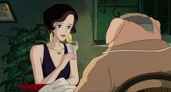 Movie still from “Porco Rosso” (1992), directed by Hayao Miyazaki – A woman sitting at a table holding a wine glass; Close Up shot, Over the shoulder angle