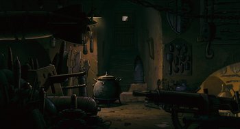 Movie still from “Porco Rosso” (1992), directed by Hayao Miyazaki – An image of an old kitchen with pots and utensils; Wide shot, High angle