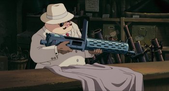 Movie still from “Porco Rosso” (1992), directed by Hayao Miyazaki – A man in a white suit holding a gun; Medium shot, Low angle