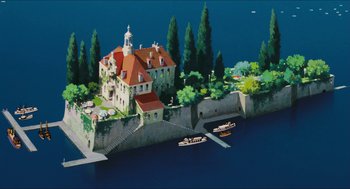Movie still from “Porco Rosso” (1992), directed by Hayao Miyazaki – An aerial view of an island in the middle of a lake; Extreme Wide shot, High angle