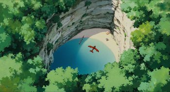 Movie still from “Porco Rosso” (1992), directed by Hayao Miyazaki – An aerial view of a plane flying through a cave; Extreme Wide shot, Overhead angle