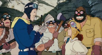 Movie still from “Porco Rosso” (1992), directed by Hayao Miyazaki – A group of people standing next to each other; Medium shot, Over the shoulder angle