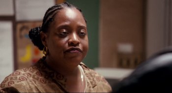 Movie still from “Precious” (2009), directed by Lee Daniels – An older woman sitting in front of a mirror; Close Up shot, Over the shoulder angle