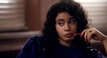 Movie still from “Precious” (2009), directed by Lee Daniels – A young woman is holding a spoon in her mouth; Close Up shot, High angle