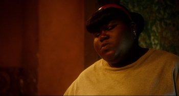 Movie still from “Precious” (2009), directed by Lee Daniels – A person wearing a hat; Close Up shot, Low angle