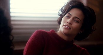 Movie still from “Precious” (2009), directed by Lee Daniels – A person wearing a red sweater; Close Up shot, Over the shoulder angle