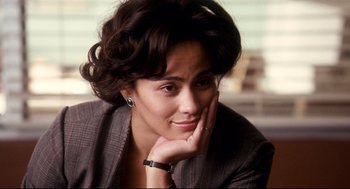 Movie still from “Precious” (2009), directed by Lee Daniels – A person sitting with her hand on her face; Close Up shot, High angle