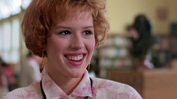 Movie still from “Pretty in Pink” (1986), directed by Howard Deutch – A person wearing a floral shirt; Close Up shot, Over the shoulder angle