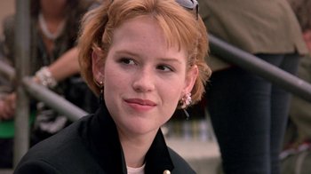 Movie still from “Pretty in Pink” (1986), directed by Howard Deutch – A person wearing a jacket; Close Up shot, Over the shoulder angle